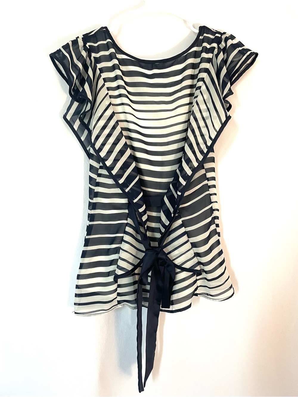 A. Navy and White Striped Ruffle Tie-Back Blouse
